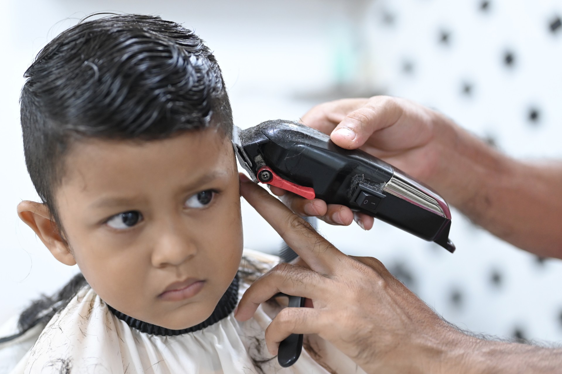 Close Up Boy getting a haircut